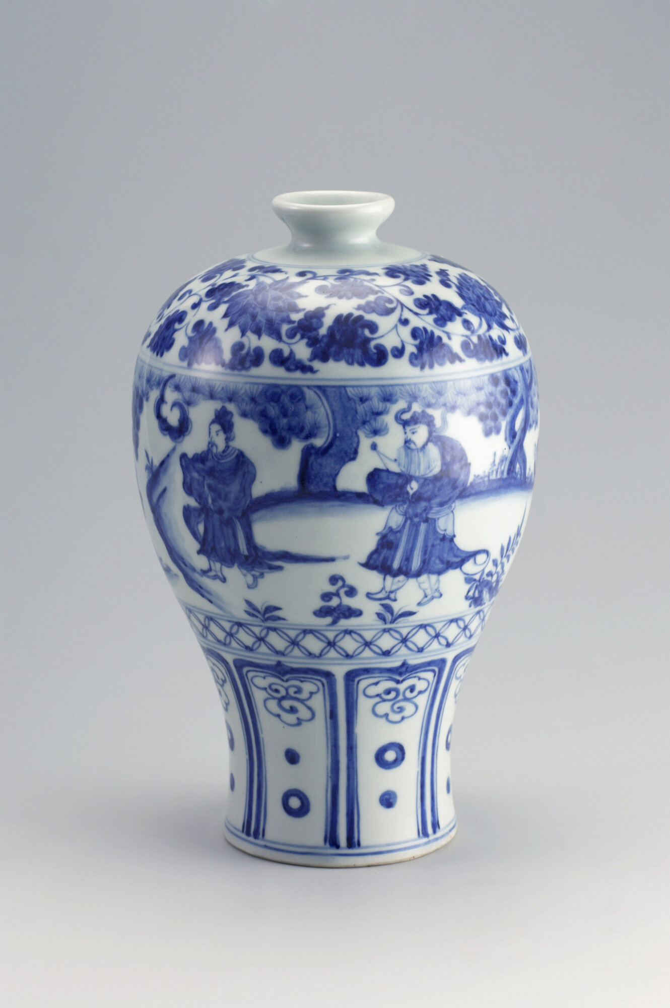 Blue and white porcelain vase with traditional Asian decorative motifs